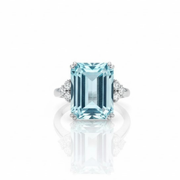 Three-Stone Emerald-Cut Blue Topaz Ring with Brilliant Diamond Side Clusters
