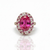 Oval Ruby Solitaire with Tapered Sunburst Halo