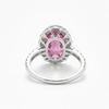 Oval Cut Ruby Solitaire with Tapered Diamond Halo