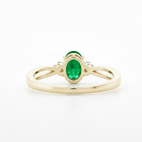Oval Emerald and Trio Lab Grown Diamond Split-Shank Solitaire