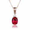 Oval-Cut Ruby Solitaire Pendant in 14KGold with Diamond Accent