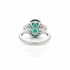 Oval Cut Emerald and Lab Grown Diamond Three-Stone Ring