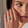 Emerald-Cut Blue Topaz Solitaire Ring in 14K White Gold with Pavé Diamond Band