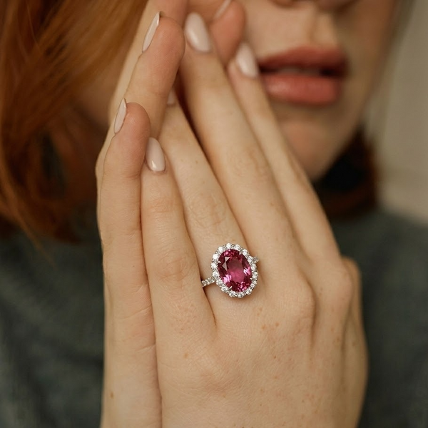 Oval Cut Ruby Solitaire with Tapered Diamond Halo