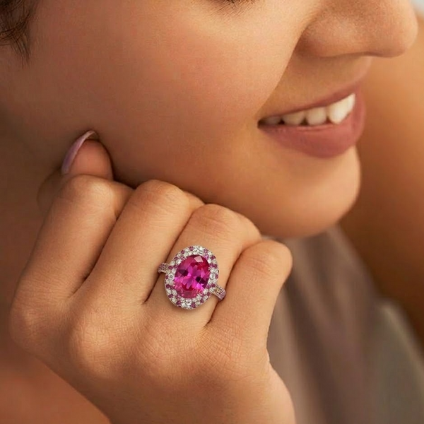 Oval Ruby Solitaire with Tapered Sunburst Halo