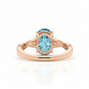 Oval-Cut Blue Topaz Ring in 14K Rose Gold with Pavé Diamond Twisted Shank