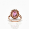 Oval Ruby Solitaire with Tapered Sunburst Halo