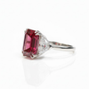 Emerald-Cut Ruby Three-Stone Ring with Diamond Accents
