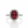 Oval Cut Lab Grown Ruby Halo Ring with Tapered Diamond Accents
