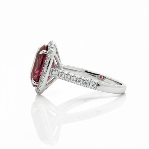 Oval Cut Lab Grown Ruby Halo Ring with Tapered Diamond Accents