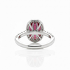 Oval Cut Lab Grown Ruby Halo Ring with Tapered Diamond Accents