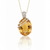Large Oval-Cut Citrine Pendant in 14K Yellow Gold with Diamond Bypass Detail