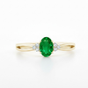 Oval Emerald and Trio Lab Grown Diamond Split-Shank Solitaire