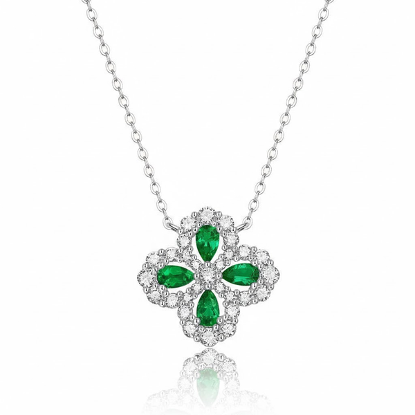 Intricate White Gold Emerald Pendant featuring a Radiant Pave Diamond Flower Motif