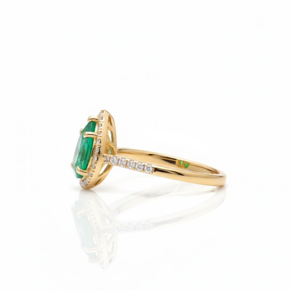 Classic Pear Emerald Halo Ring with Brilliant Accents Lab Grown