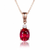 Oval-Cut Ruby Solitaire Pendant in 14KGold with Diamond Accent