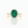 Oval Cut Emerald and Lab Grown Diamond Three-Stone Ring