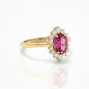 Princess-Inspired Oval Ruby with Brilliant Halo