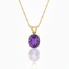 Oval-Cut Amethyst Solitaire Pendant in 14K Yellow Gold with Modern V-Bale